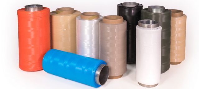 spools of custom yarns for narrow fabrics